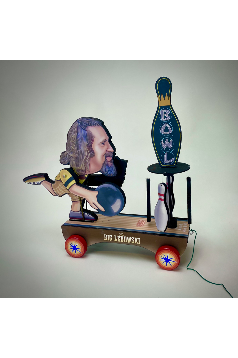 "Big Lebowski Animated Wooden Toy" by Steve Casino