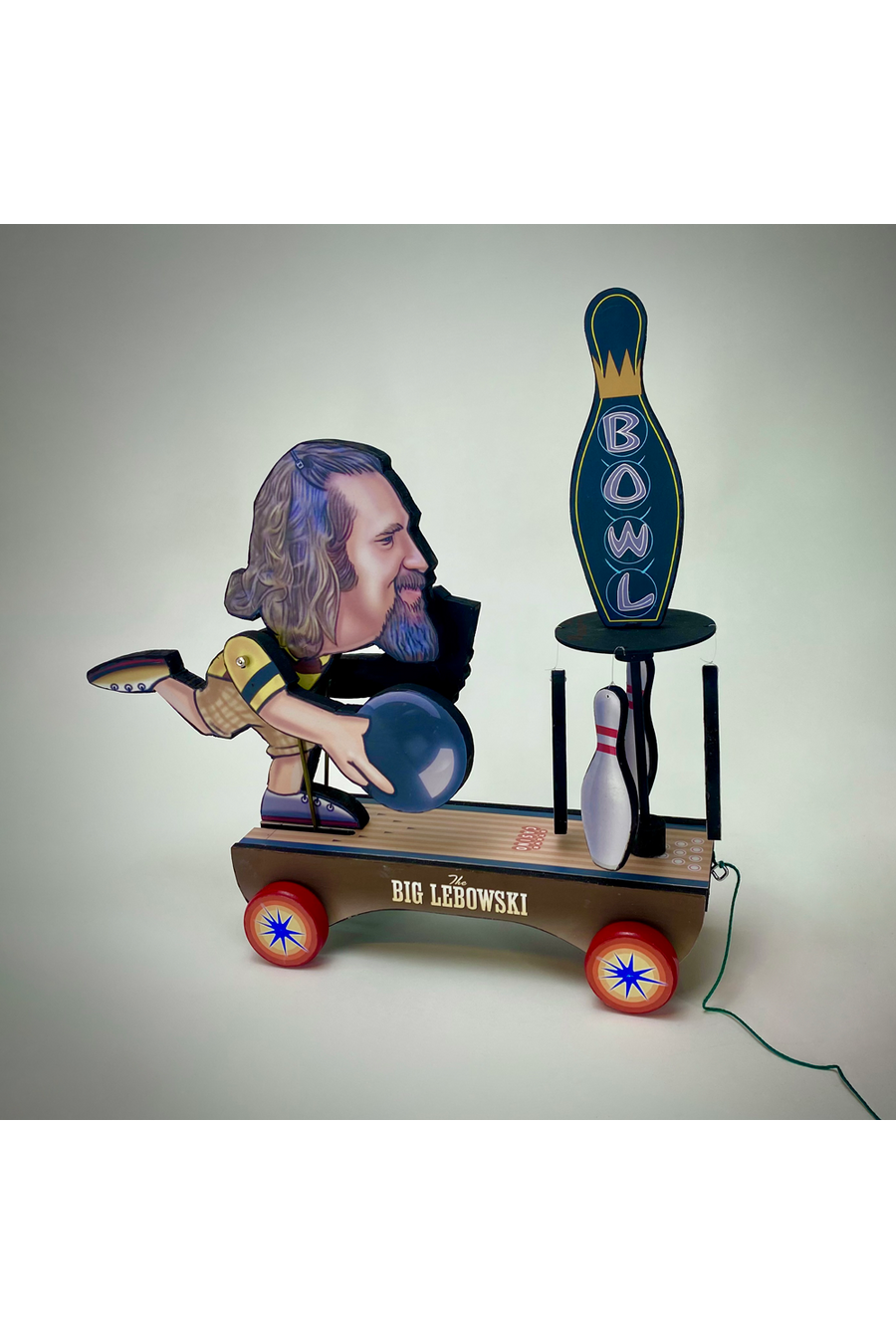 "Big Lebowski Animated Wooden Toy" by Steve Casino