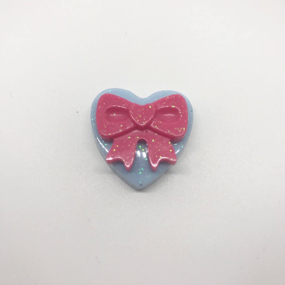 057. "Blue Heart with Pink Bow" Pin by Dare to Dream Flair - Hero Complex Gallery