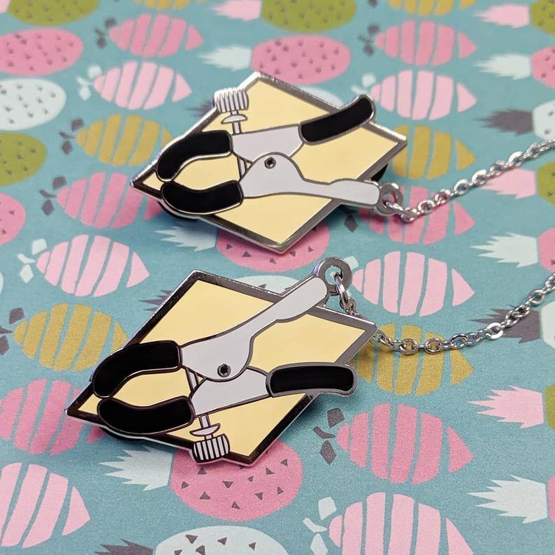 408. "Clamps" Pin by Cunning Linguist Co. - Hero Complex Gallery