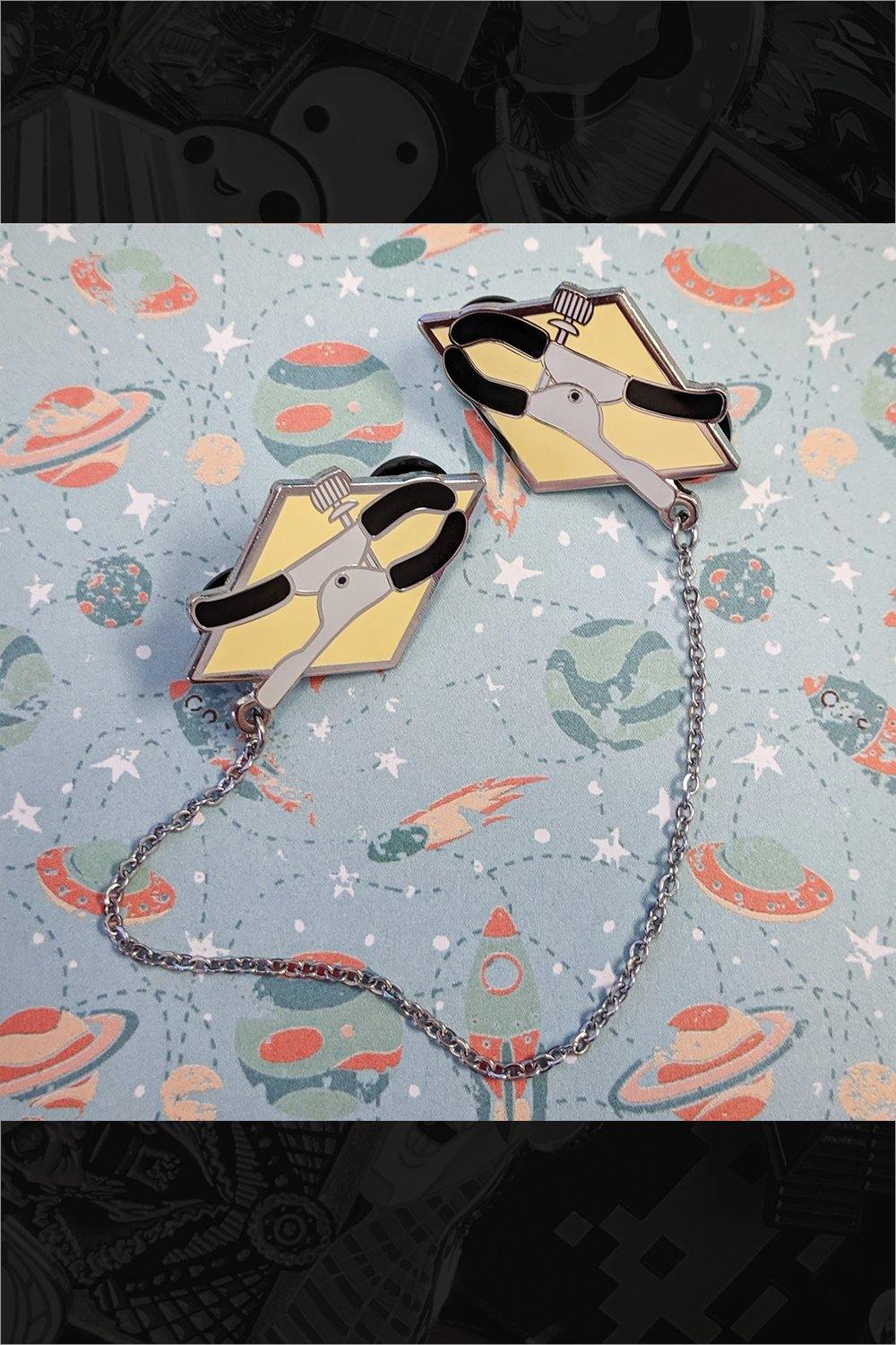 408. "Clamps" Pin by Cunning Linguist Co. - Hero Complex Gallery